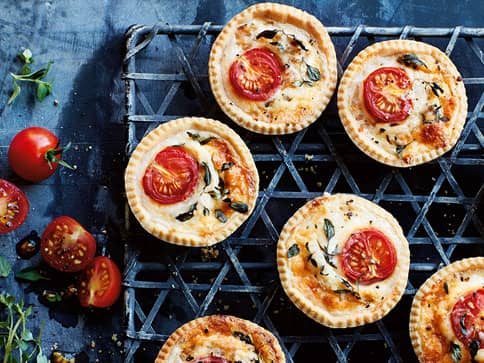 Mini Cheese & Tomato Tartlets recipe by Annabel Karmel