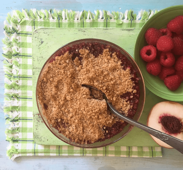 Peach, Apple, Blueberry & Raspberry Crumble recipe by Annabel Karmel